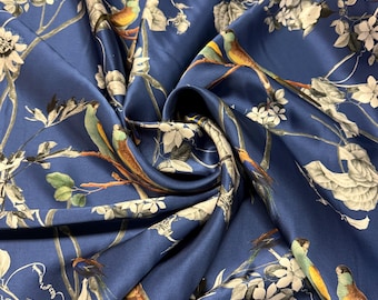 100% silk satin charmeuse digital print 54" wide    Beautiful navy base with copper branches and floral birds design silk 54” wide