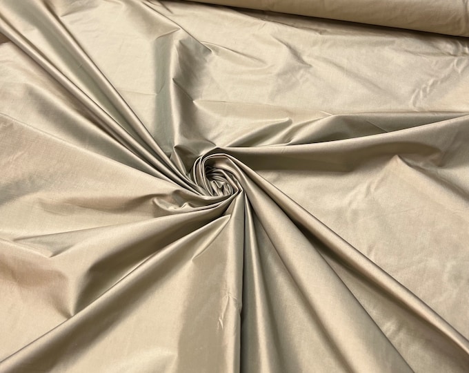 Beautiful Olive Green Irredescent 100% silk taffeta 54” wide.  Best used for apparel and home Decore.  Sold by the yard