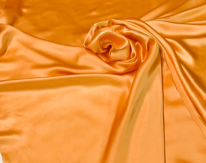 Silk charmouse 54" wide    Beautiful soft  orange color silk satin charmeuse fabric sold by the yard