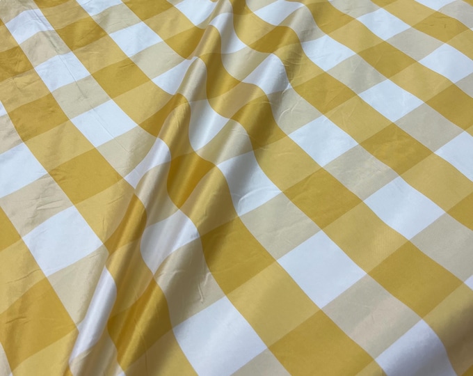 Beautiful Bright yellow and white taffeta plaids 54” wide.  Best used for home decor and appreal.  Sold by the yard