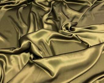 Silk charmouse 54" wide    Beautiful dark olive green color silk satin charmouse fabric sold by the yard