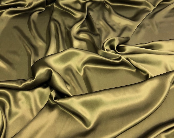 Silk charmouse 54" wide    Beautiful dark olive green color silk satin charmouse fabric sold by the yard