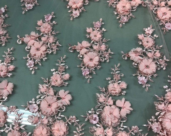 Hand beaded floral design with 3D flowers baby pink  lace on mesh fabric sold by the yard