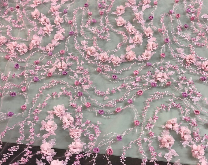 Hand beaded floral design with 3D flowers dusty rose pink color lace on mesh fabric sold by the yard