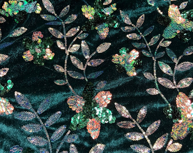 Velvet with sequence embroidered 45" wide   Beautiful inter green velvet with floral leaves sequence pinkish green. sold by the yard