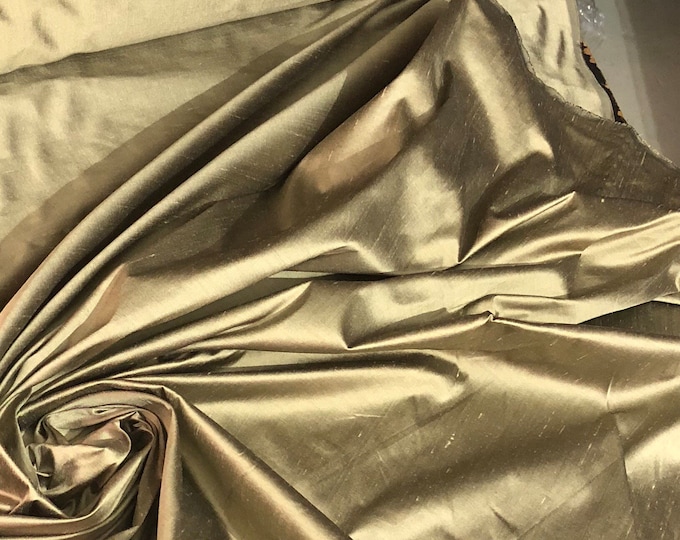 Silk shantung 54" wide   Beautiful antique gold color silk shantung fabric sold by the yard
