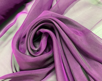 Beautiful Irredescent dark egg plant color silk chiffon 54” wide.  Best used for apparel.  Sold by the yard