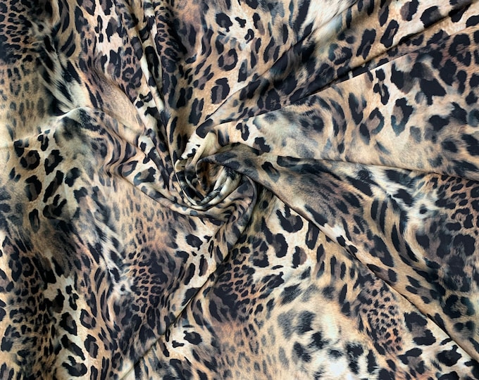Digital satin Charmouse print 54” wide. Beautiful leopard animal print fabric beat used for apparel. Sold by the yard