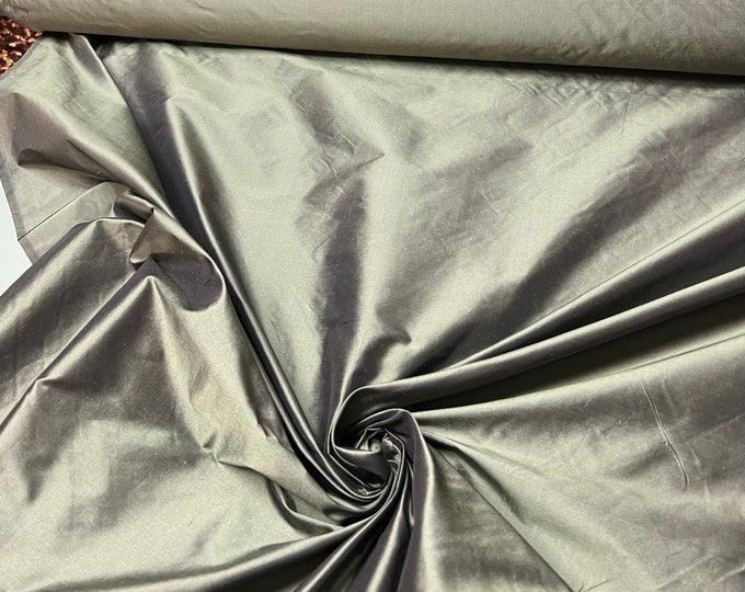 Beautiful green gold Irredescent 100% silk taffeta 54” wide.  Best used for apparel and home Decore.  Sold by the yard