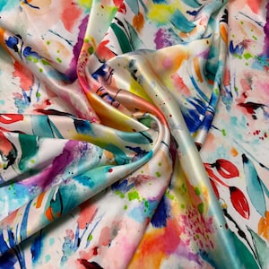 100% silk satin charmeuse digital print 54&quot; wide    Beautiful ivory base with pastel colors hand paint style abstract silk fabric 54” wide