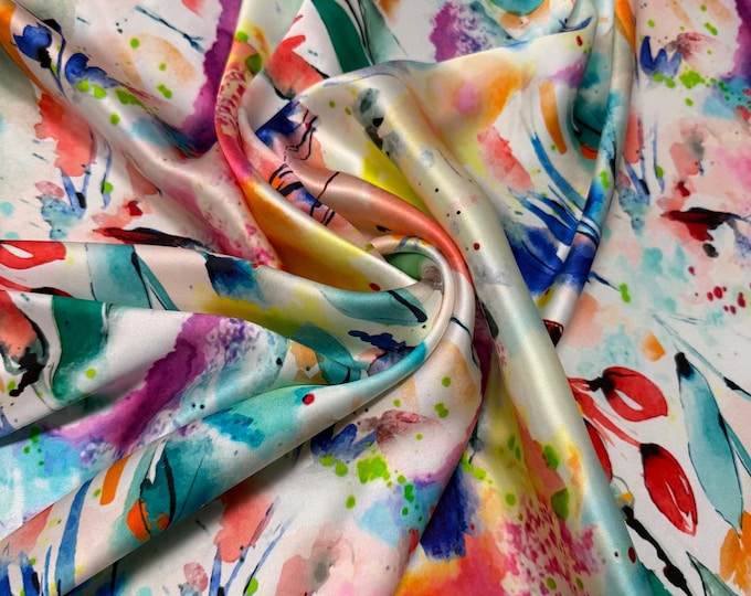 100% silk satin charmeuse digital print 54" wide    Beautiful ivory base with pastel colors hand paint style abstract silk fabric 54” wide