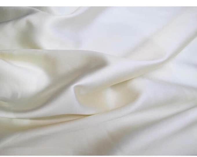 Ivory Poly Mikado/Zibelline  Fabric. 60" Wide Mikado Fabric is a unique blend makes this fabric soft & Gives Structure to  Dress.