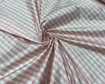 Beautiful taffeta Baby Pink & white gingham check 54” wide.  Best used for apparel and home Decore.  Sold by the yard