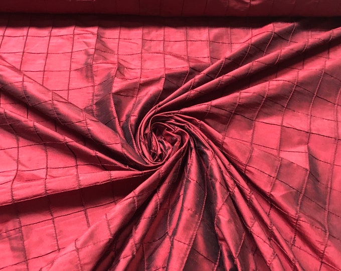 Beautiful wine color silk shantung pintuck 52” wide. Best used for home decor & appreal. Sold by the yard