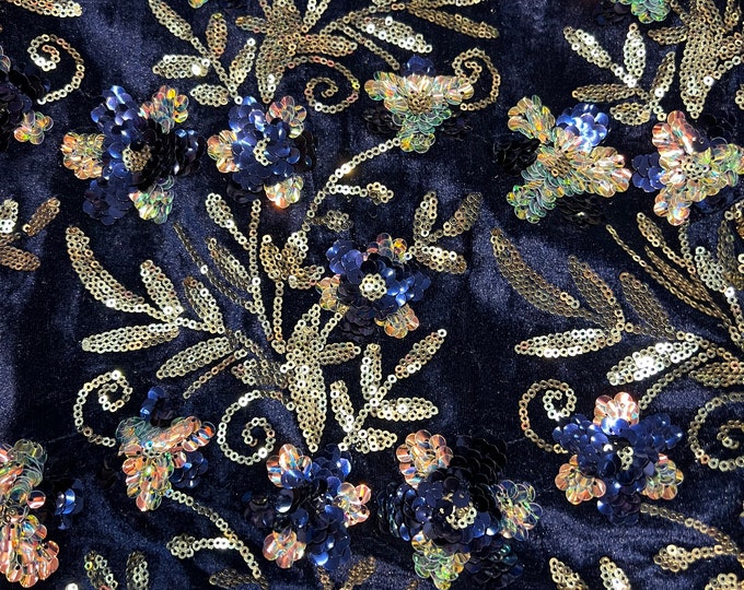 Velvet with sequence embroidered 45" wide   Beautiful Navy velvet with floral leaves sequence blue and gold . sold by the yard