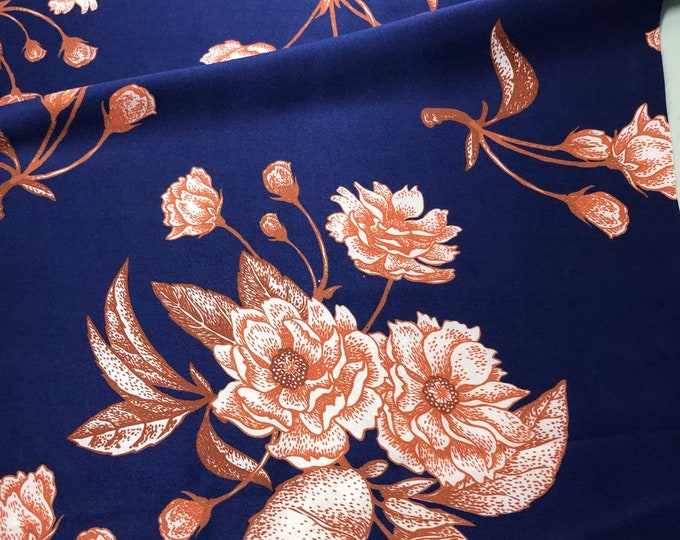 100% silk satin charmeuse digital print. Beautiful bright navy royal blue with ivory copper floral design silky soft fabric 54” wide