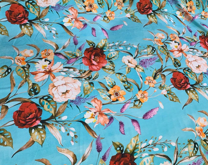 100% silk satin Charmouse print 54” wide.  Beautiful turguise base multi color floral print beat used for apparel.  Sold by the yard