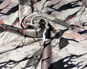 100% silk satin charmeuse digital print 54" wide    Beautiful ivory base with gray pink black abstract design silk 54” wide