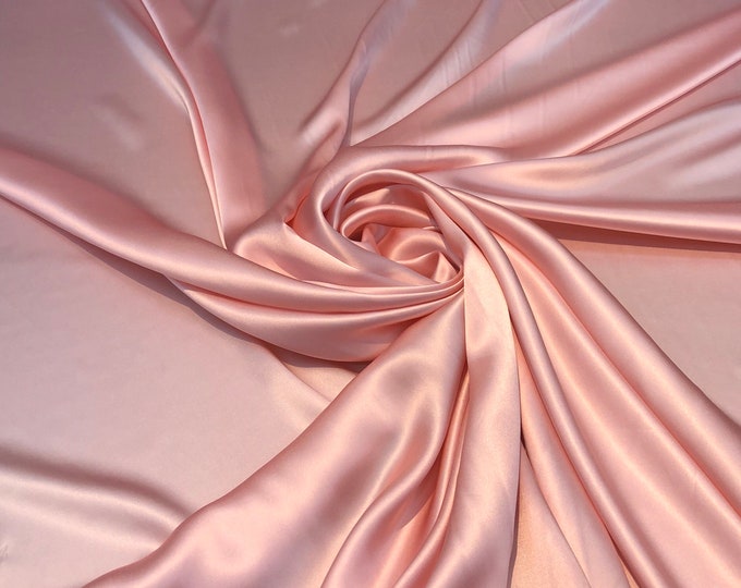 Silk charmouse 54" wide    Beautiful baby pink silk satin charmouse fabric sold by the yard