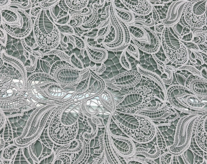 Guipure lace fabric 50” wide. Beautiful paisley style all over design, natural white color.