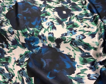 100% silk satin charmeuse digital print 54" wide    Beautiful ivory base with royal navy blue green border floral design silk 54” wide