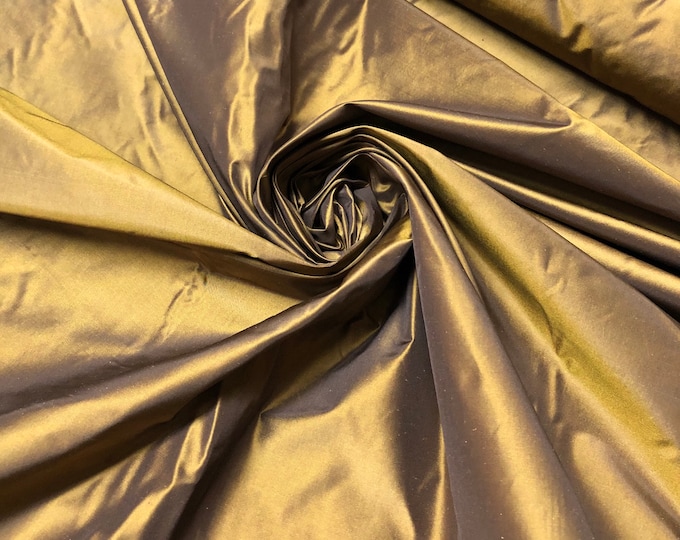 Beautiful copper gold silk taffeta 54” wide. Best used for apparel and home decor. Sold by the yard