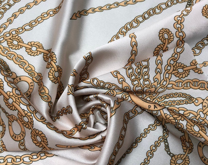 Soft Satin charmeuse digital print 54" beautiful champagne base with gold jewelry style digital print   Fabric sold by the yard