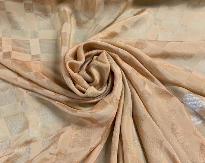 Beautiful mustard jaquard checker pattern Irredescent silk chiffon 54” wide.  Best used for home Decore and apparel.  Sold by the yard
