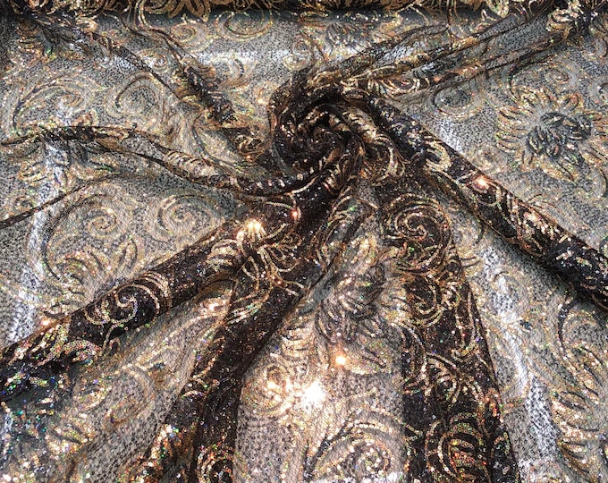 Allover floral pattern sequins 56" wide   Beautiful black & gold floral pattern sequins fabric sold by the yard