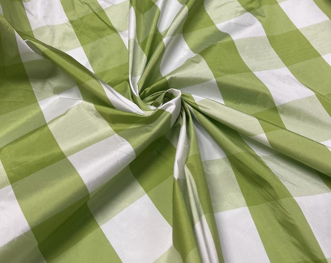 Beautiful Bright Green and white taffeta plaids 54” wide.  Best used for home decor and appreal.  Sold by the yard