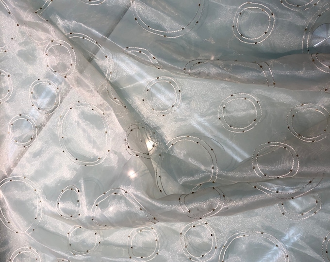 Ivory organza cirlce embroidery with beads 60" wide    Beautiful ivpry color    Fabric sold by the yard