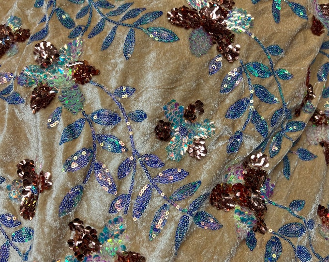 Velvet with sequence embroidered 45" wide   Beautiful light gold velvet with sequence florescent purple brownish sequin. sold by the yard