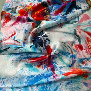100% silk Soft Satin charmeuse digital print 54&quot; wide   Beautiful ivory base with bluesh red gray watery abstract design   Fabric