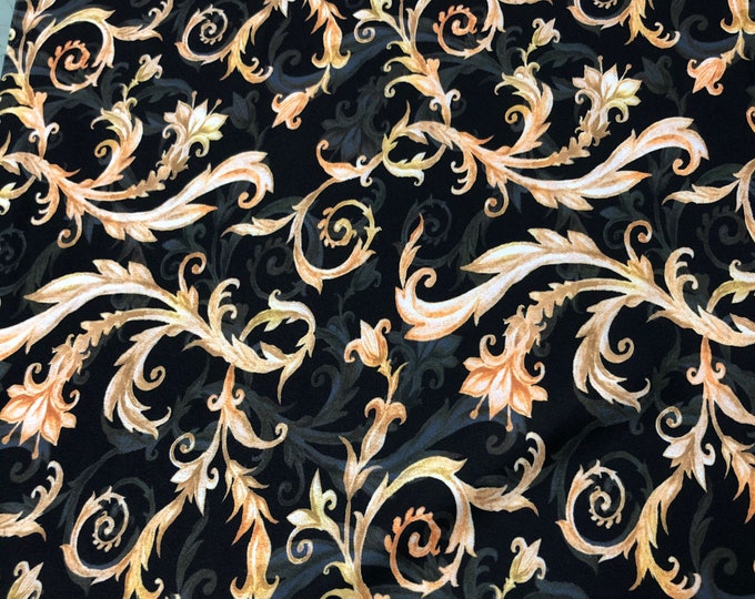 Beautiful black base with gold abstract designer digital print on silky satin Charmouse 54” wide. Sold by the yard. Best used for apparel