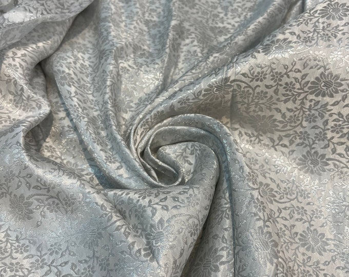 Jaquard floral brocade 44" wide   Beautiful Silver gray  floral brocade fabric sold by the yard   Useable for apparel and interior decore
