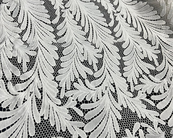 Guipure lace fabric 50” wide. Beautiful branches with leaves all over design, natural white color.