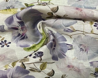 100% Linen designer print, Ivory base with lilac green light pink floral  designer printed linen. 58” wide Sold by the yard