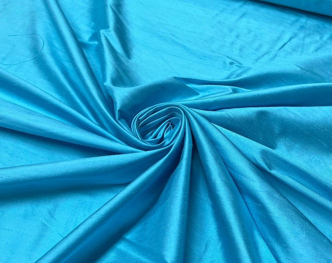 Silk shantung 54" wide   Beautiful turquoise blue color silk shantung fabric sold by the yard