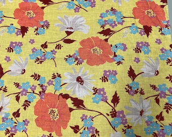 100% Linen designer print, yellow base with orange gray turquoise purple  allover floral  designer printed linen. 58” wide Sold by the yard