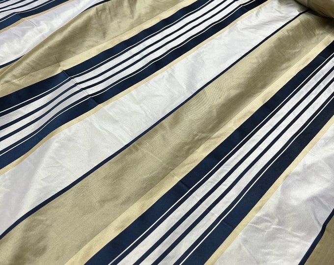 Silk taffeta satin stripe 54" wide     Beautiful ivory champagne gold with navy satin stripe silk taffeta Fabric sold by the yard