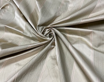 100% silk beautiful beige mint green tiny check and mint green satin stripe plaids .  silk taffeta 54" wide            Sold by the yard