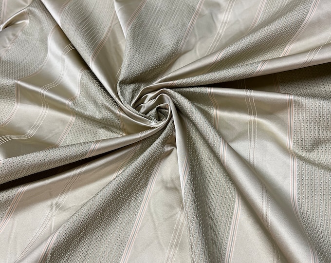 100% silk beautiful beige mint green tiny check and mint green satin stripe plaids .  silk taffeta 54" wide            Sold by the yard