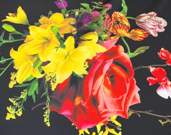 Beautiful black base with multi color flowers pattern digital print on silky satin 54” wide. Sold by the yard. Best used for apparel
