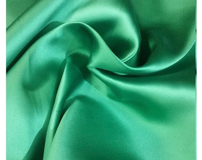 Bottle green Poly Mikado/Zibelline  Fabric. 60" Wide Mikado Fabric is a unique blend makes this fabric soft & Gives Structure to  Dress.