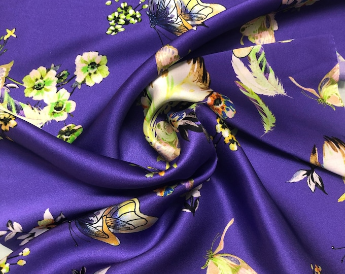 100% silk satin charmeuse digital print 54" wide    Beautiful bright purple woth floral and butterfly print silky soft fabric 54” wide