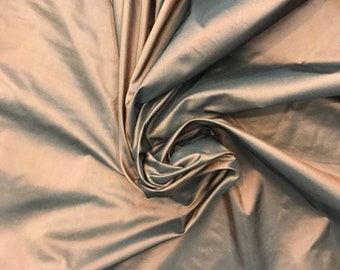 Silk taffeta 54" wide     Beautiful iridescent copper color silk taffeta fabric sold by the yard