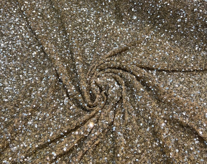 Beautiful lemon yellow on yellow tiny florescent sequin hand embroidered on silk chiffon 45” wide. Best use for apparel