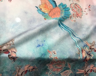 100% silk satin face organza, also called silk Gazzar 54” wide. Beautiful turguise burnt orange shades flying bird design.