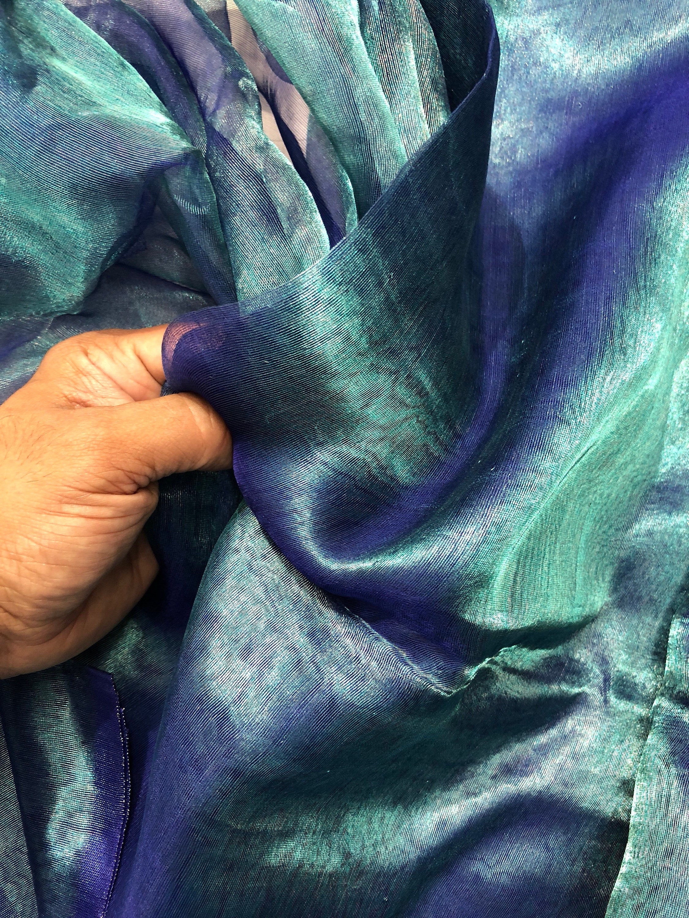 Metallic peacock color 100 silk organza 45 wide usable for apparel Metallic peacock color 100 silk organza 45 wide usable for apparel