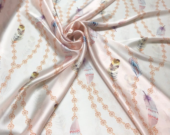 100% silk satin charmeuse digital print 54" wide    Beautiful pastel peach pink with multi color feather design print  silky soft fabric